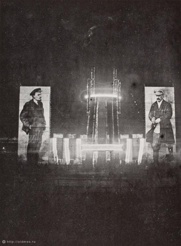 Festive illumination with portraits of leaders, Lenin and Stalin