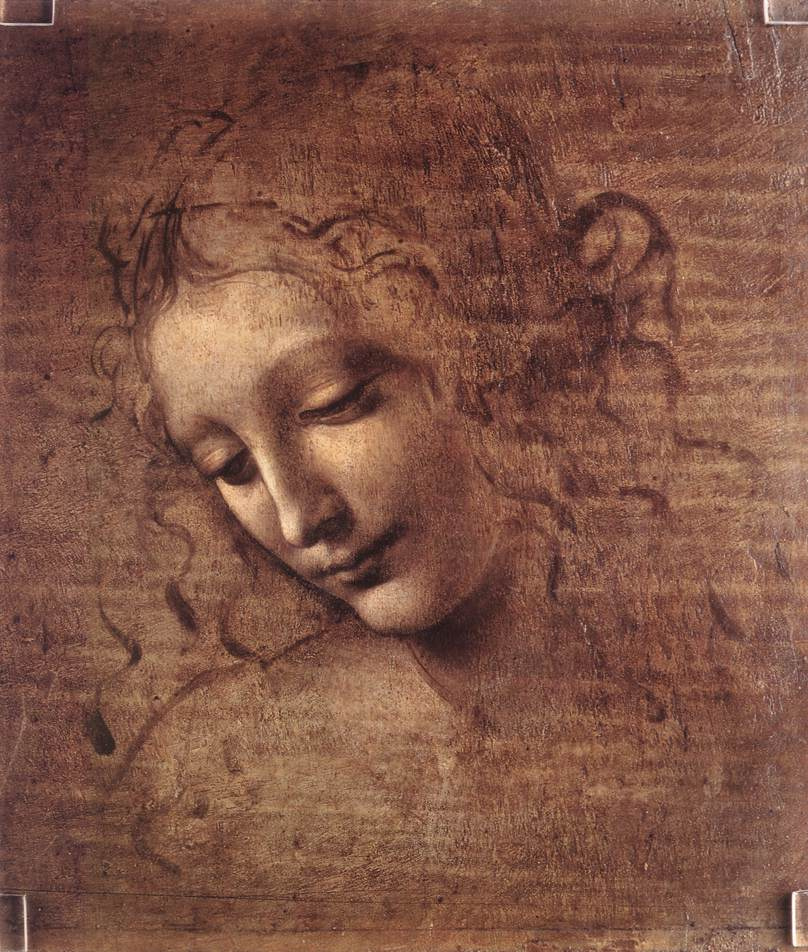 head of a young woman with disheveled hair