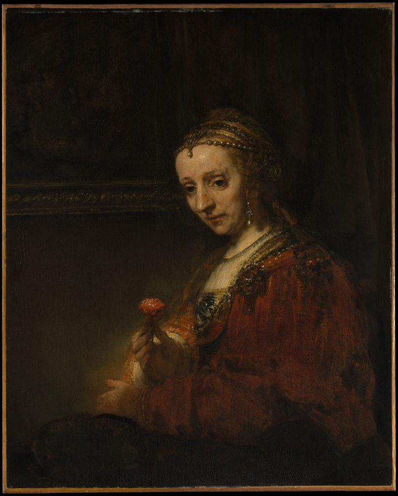 Rembrandt Harmenszoon van Rijn. Portrait of a woman with a carnation