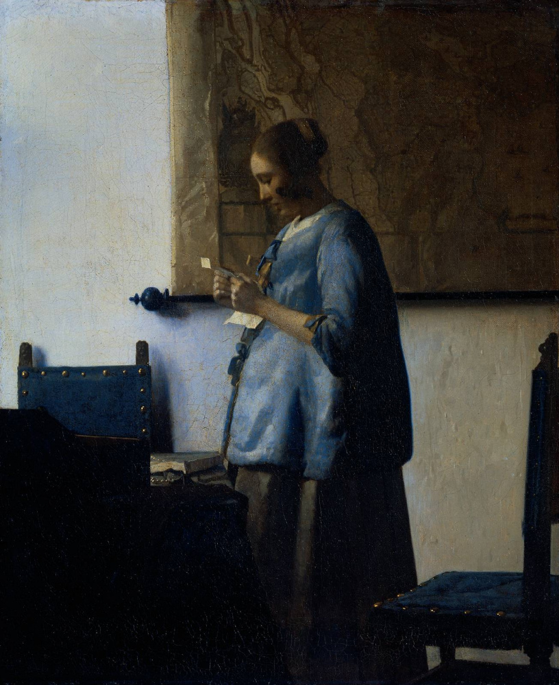 Jan Vermeer. Woman in blue reading a letter