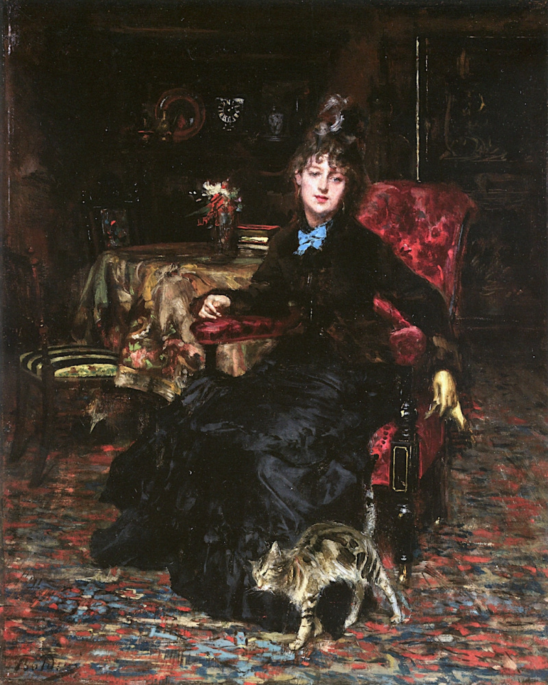 Mujer sentada con un gato