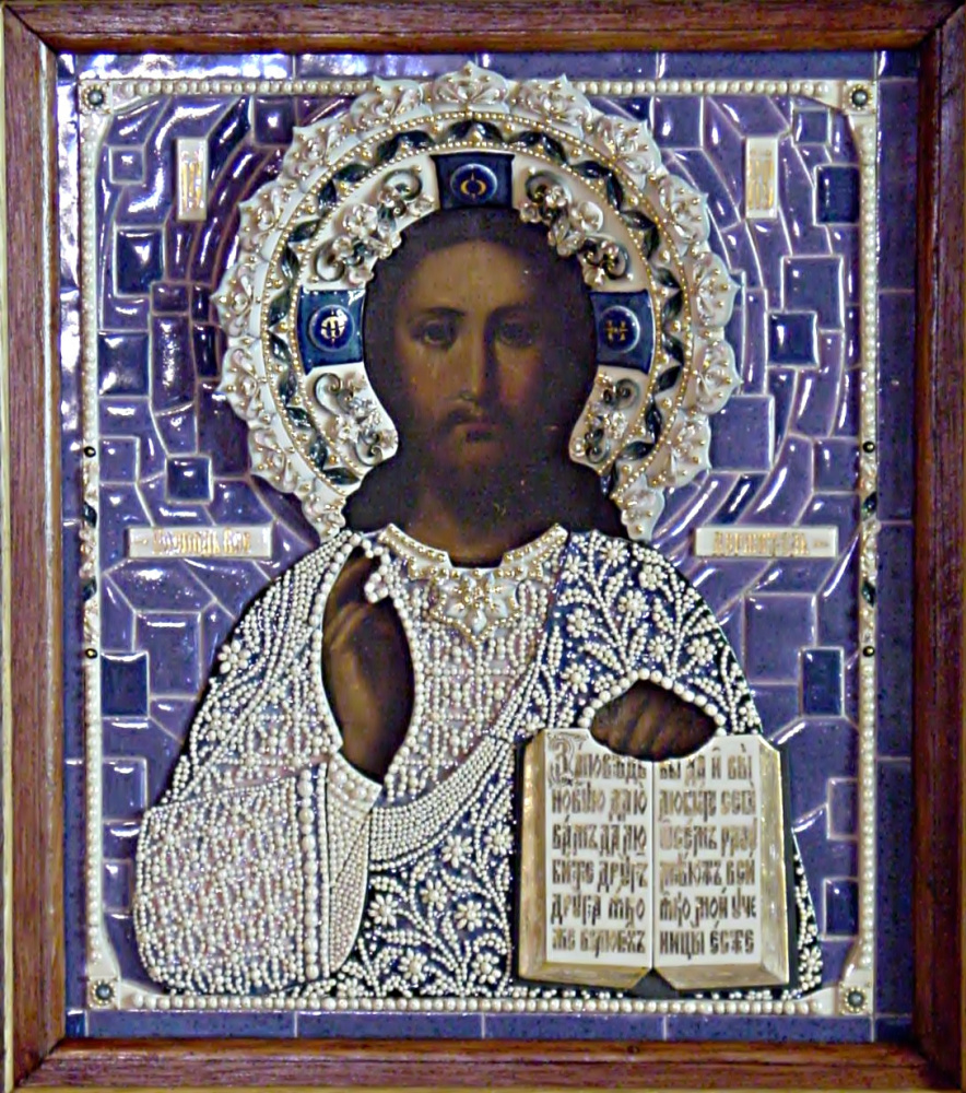 Icon of Christ Pantocrator in a porcelain frame and carved icon case