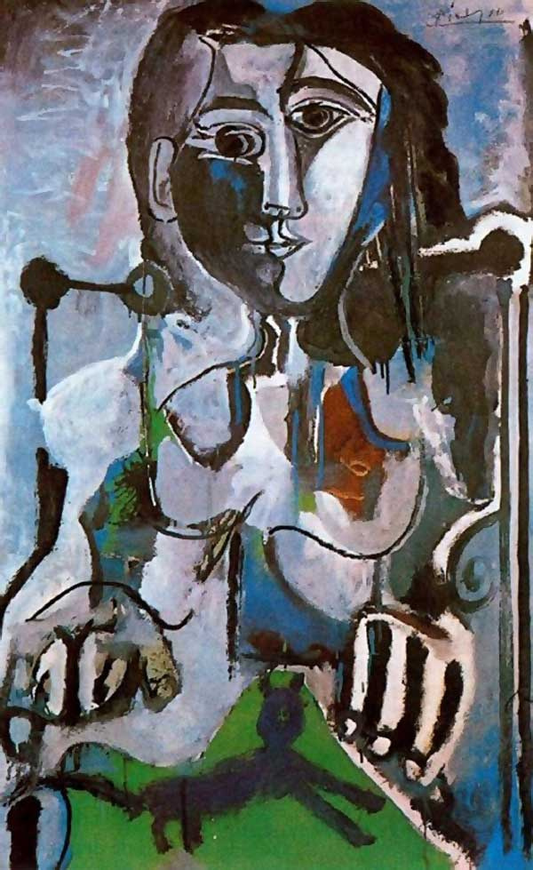 Pablo Picasso. Woman with a cat sitting in the chair