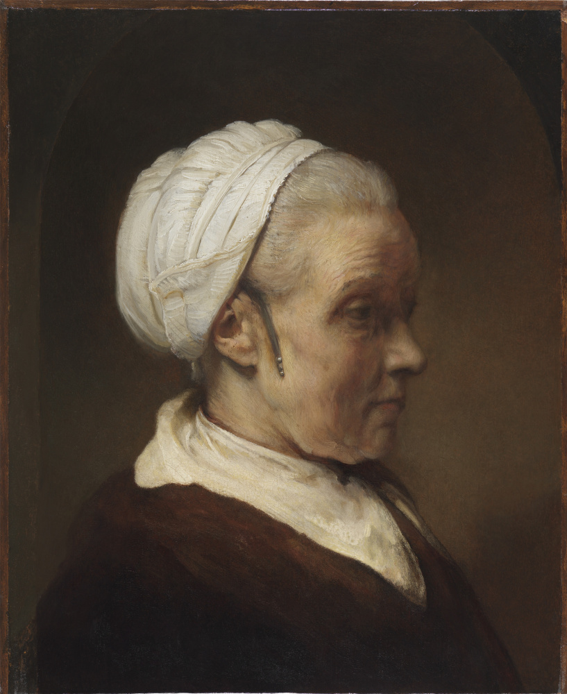 Rembrandt Harmenszoon van Rijn. 一名妇女的剪影一个白色盖帽的