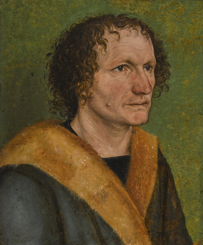 Albrecht Dürer. PORTRAIT OF A MAN AGAINST A GREEN BACKGROUND