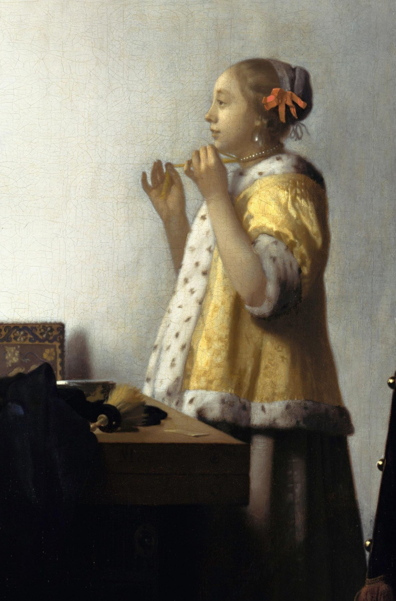 Jan Vermeer. Girl with a pearl necklace. Fragment