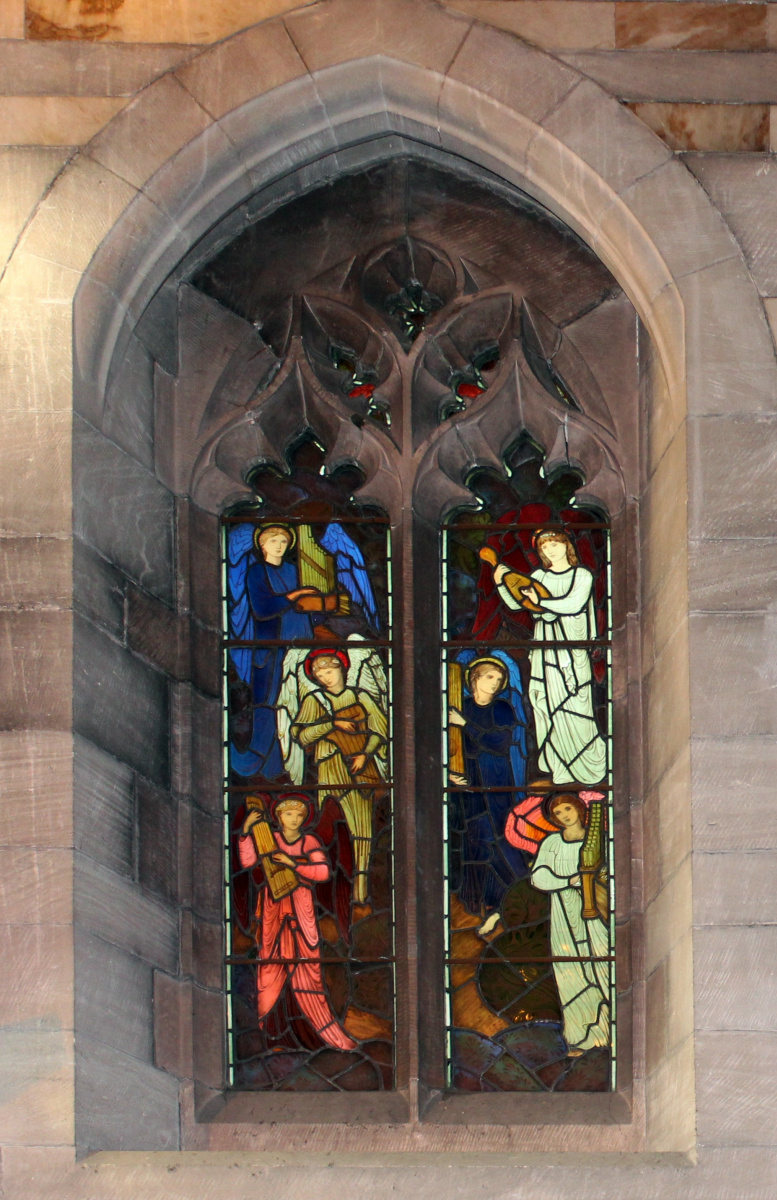 The window of the altar of All Saints with the archangels Michael and Gabriel