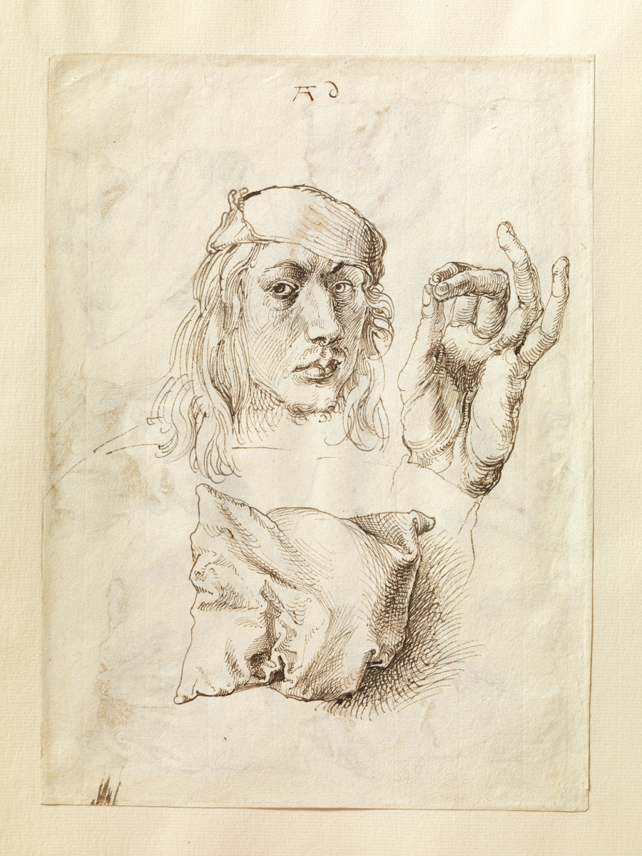 Albrecht Durer. Selbstporträt mit einer Skizze von Händen und Kissen (Vorderseite des Blattes)