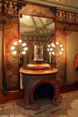 The interior of the jewelry house of Georges Fouquet. Sketch of the fireplace with a sculpture, a mirror, a showcase, and details of ornament for the walls