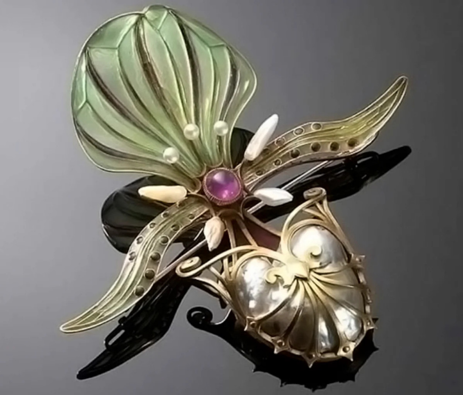 René Lalique. Orchid brooch. Rubies, enamel, pearls, mother-of-pearl, gold.