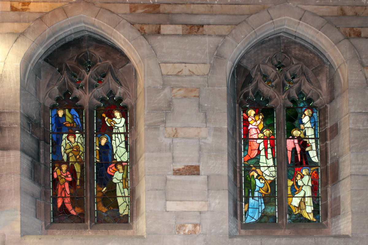 The window of the altar of All Saints with the archangels Michael and Gabriel