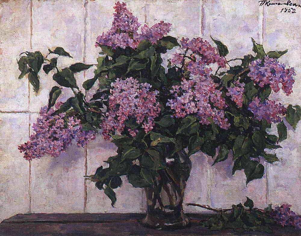 Petr Petrovich Konchalovsky. Lilac in a glass jar on the background of the stove