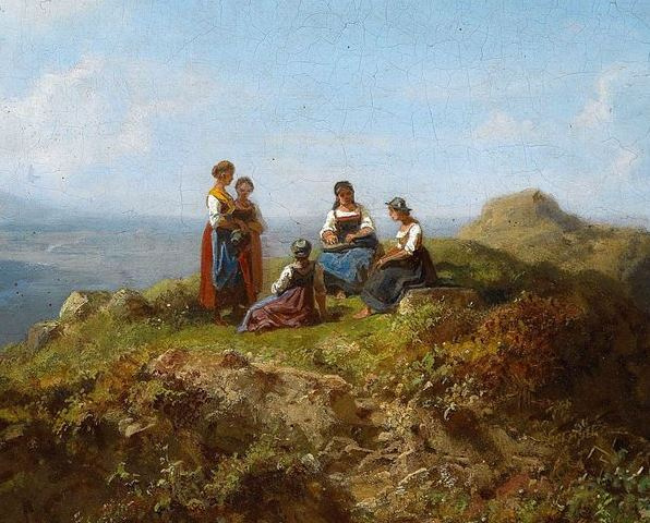 The Alpine landscape. Girls-maids on top of a hill