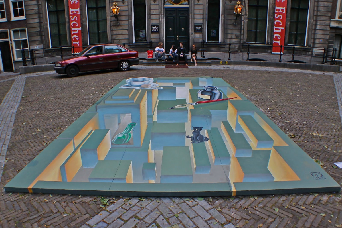 Maurits Cornelis Escher. Arte di strada all'ingresso del Museo Escher (2012)