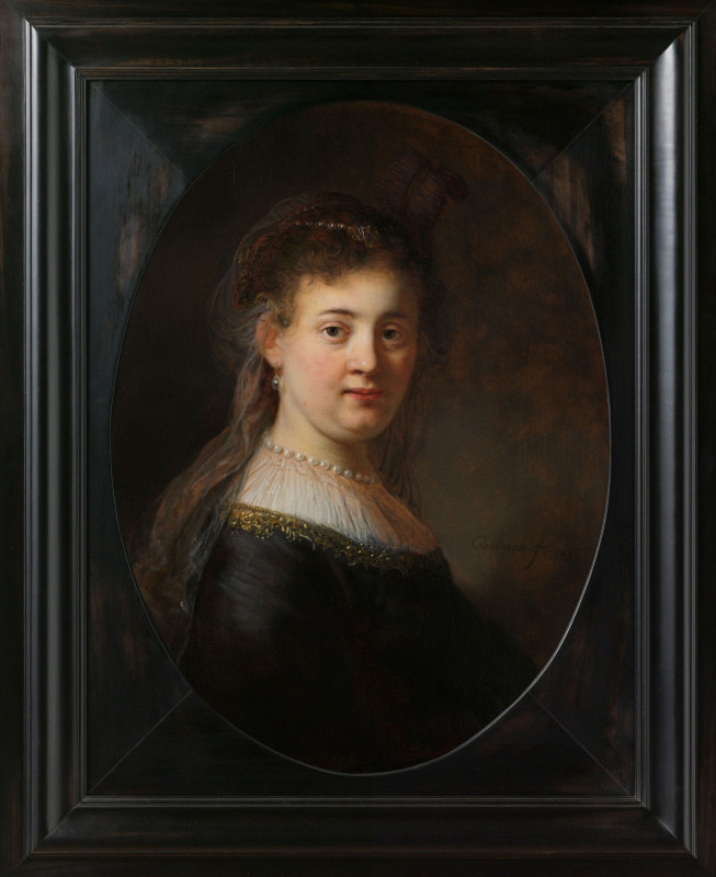 Rembrandt Harmenszoon van Rijn. Portrait of young woman in fancy costume