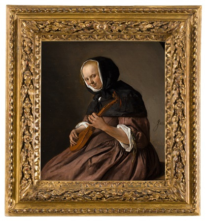 The woman playing on the sitter